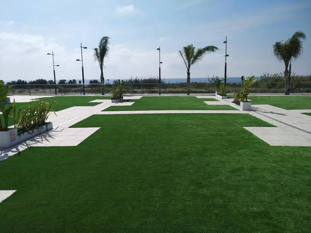 Apartamento En Primera Linea De Playa, Con Piscina Y Garaje En Torrox Costa